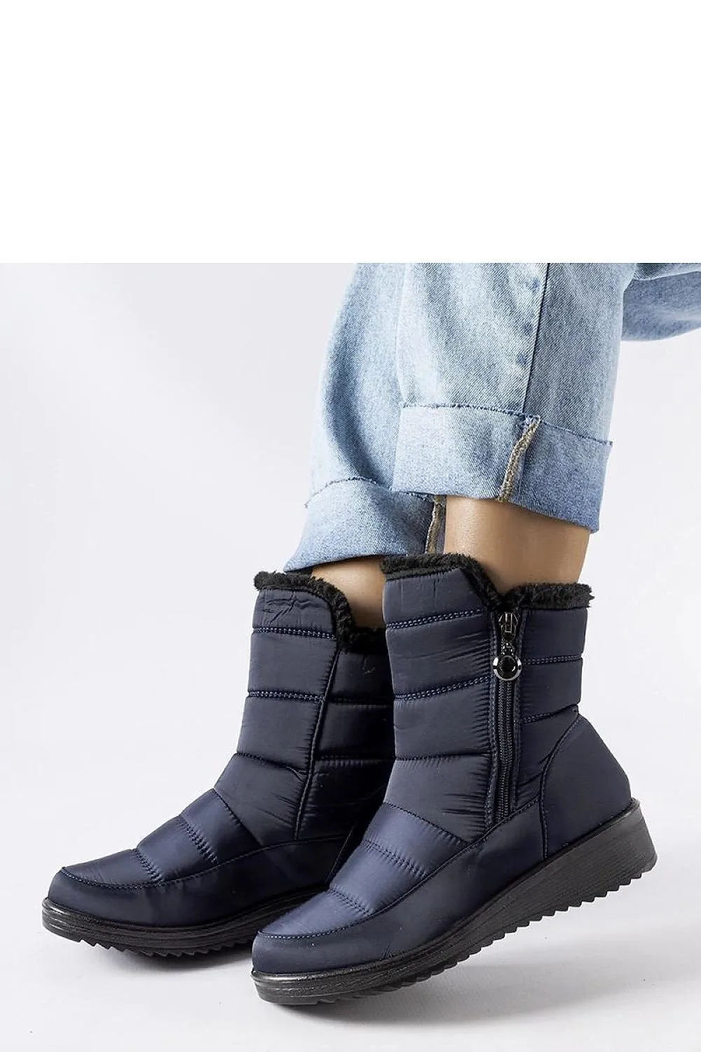 Navy snow boots with a low Mount wedge