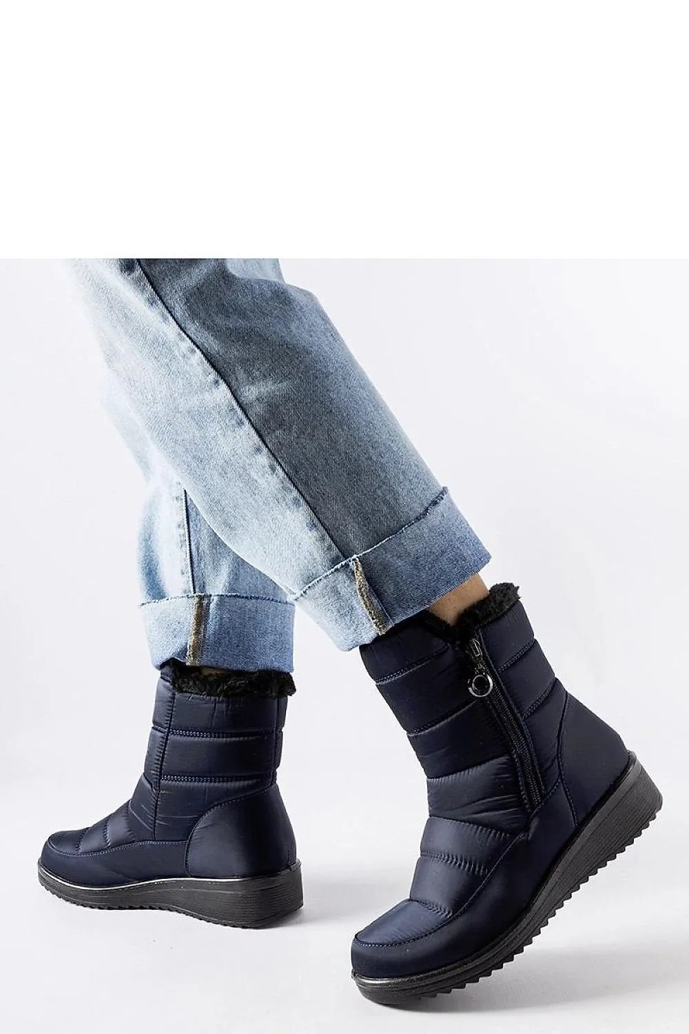 Navy snow boots with a low Mount wedge
